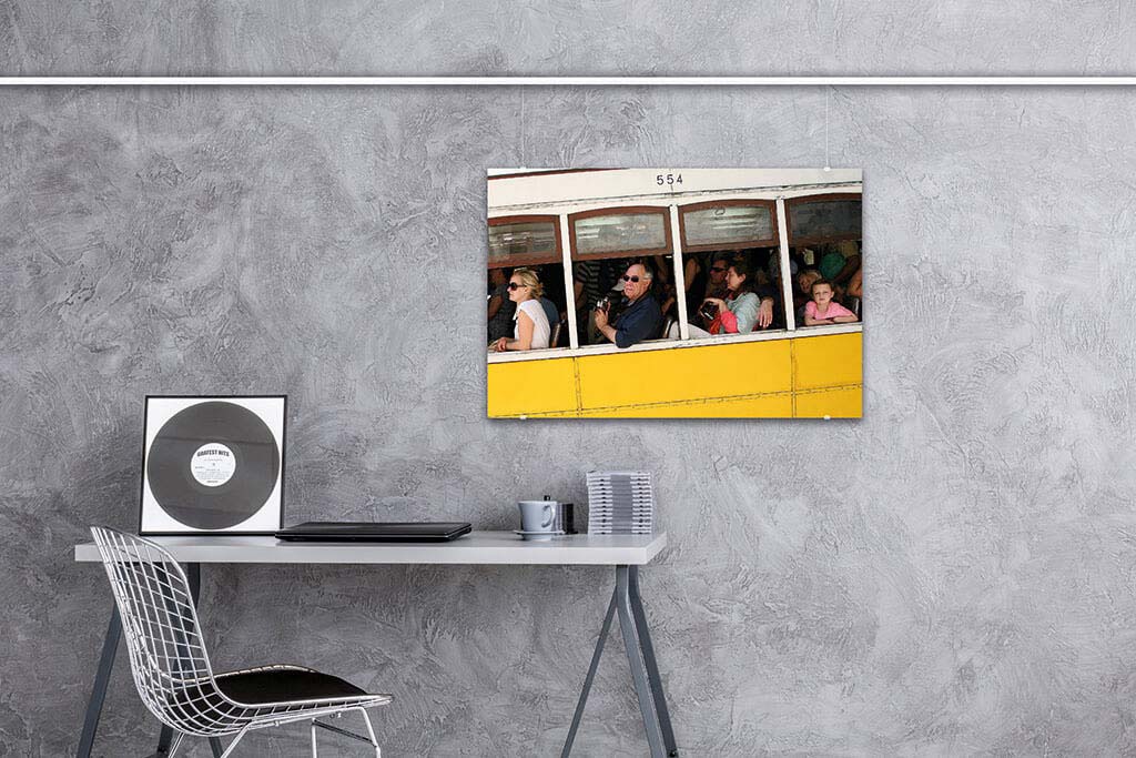 Picture hung on the wall with a art hanging system